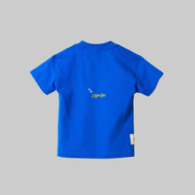 Load image into Gallery viewer, Blue t-shirt with a logo on the back against a white background
