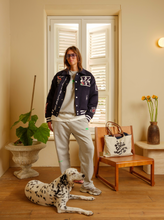Load image into Gallery viewer, Curaçao to the World - Kokolishi Varsity Jacket