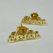 Load image into Gallery viewer, Gold nameplate stud earrings spelling 'Hana' on a plain light gray background.
