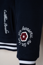 Load image into Gallery viewer, Curaçao to the World - Kokolishi Varsity Jacket
